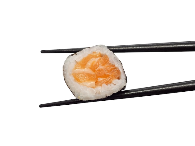 Japanese salmon maki sushi roll with chopsticks isolated on white background with clipping path