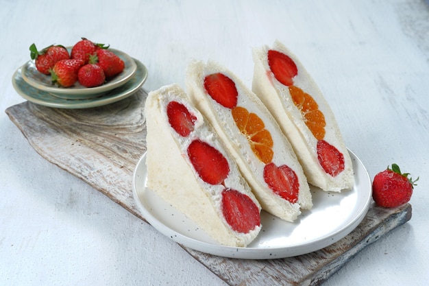 japanese style sweet fruits sandwich (fruit sando ) with lots of fruits.Sweet  summer breakfast