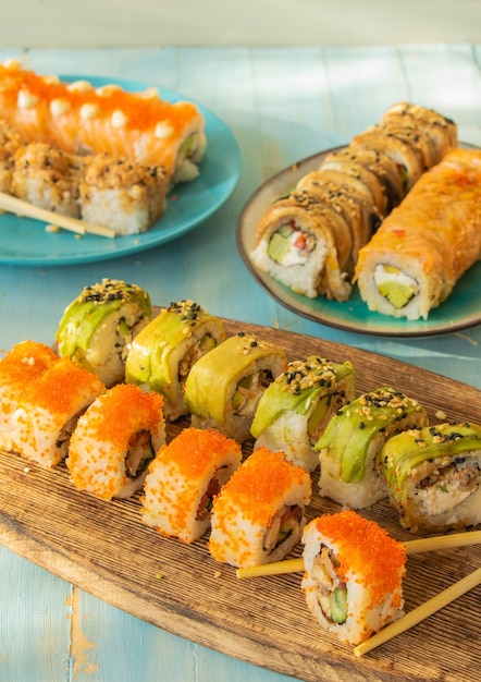 Japanese sushi food Maki and rolls with tuna salmon shrimps assorted Selective focus