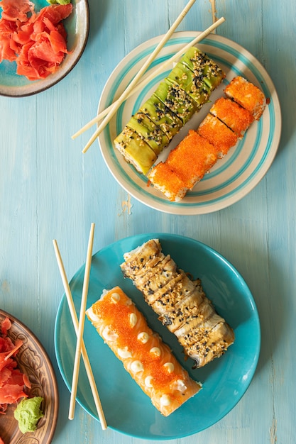 Japanese sushi food Maki and rolls with tuna salmon shrimps assorted View from above