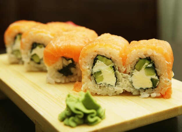 Japanese sushi served on wooden board