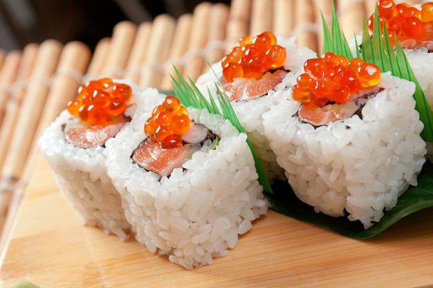 Japanese sushi  traditional japanese food.Roll made of Smoked fish and red roe