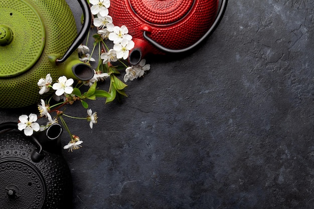 Japanese tea in tea pot and cherry blossom