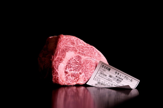 Japanese Wagyu beef. Premium meat product on black background.