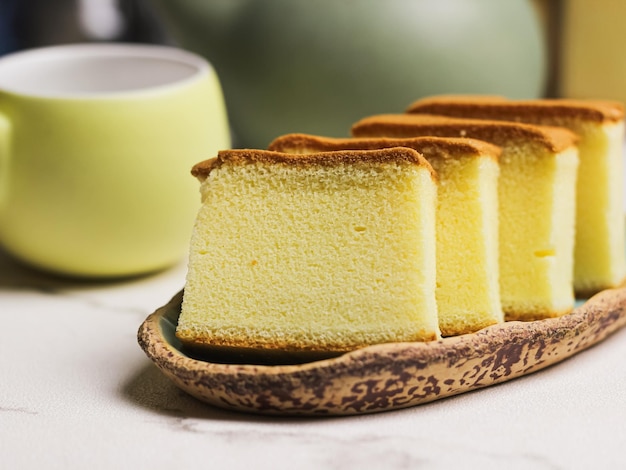 Japanesse Cake served in green oval ceramic plate