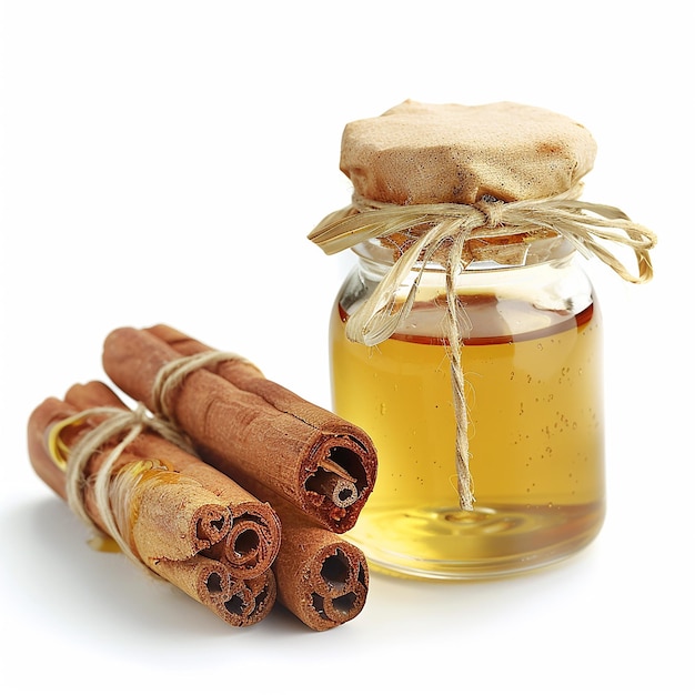 a jar of cinnamon sticks with a string tied around the top