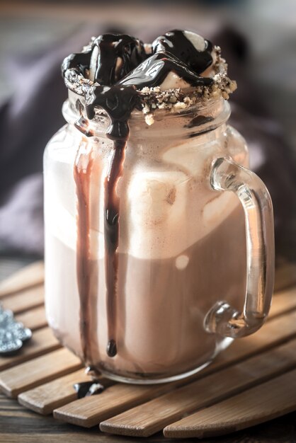 A jar of hot chocolate with marshmallows