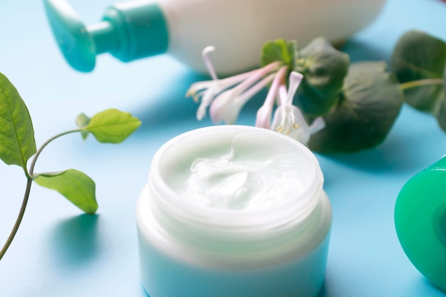 Jar of natural cream on light background