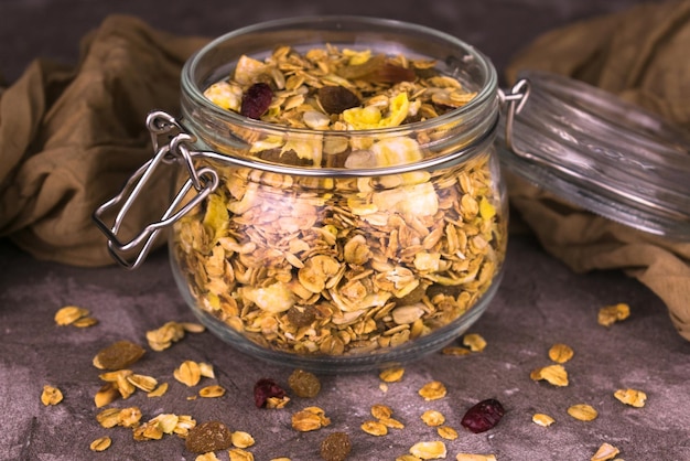 Jar with homemade granola  Closeup