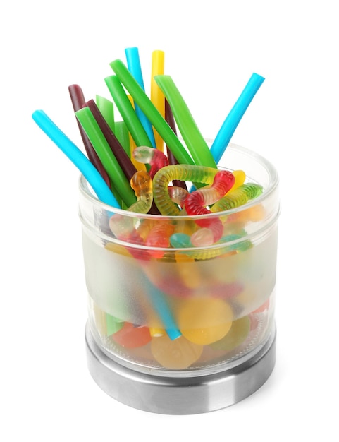 Jar with tasty jelly candies on white background