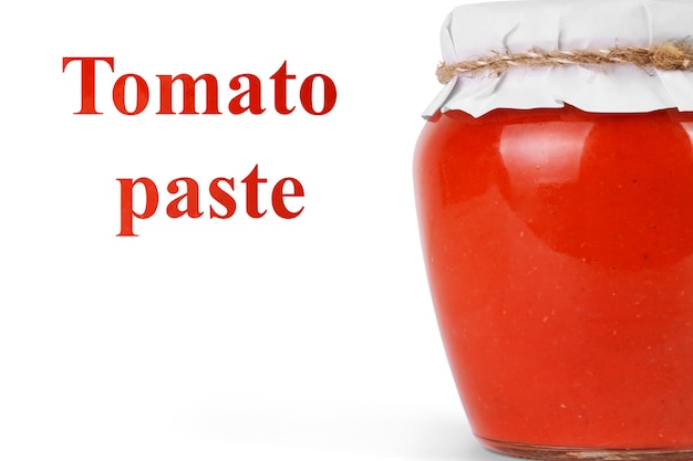 Photo jar with tomato paste isolated on white