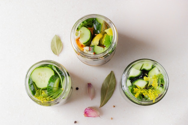 Jars with pickled vegetables. Top view.