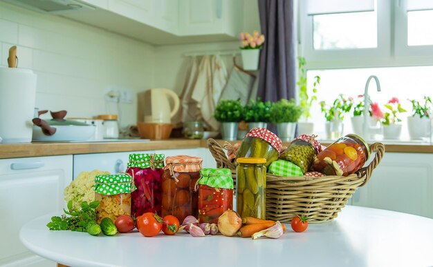 Jars with preserved vegetables for the winter Selective focus