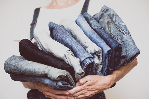 Jeans in her hands