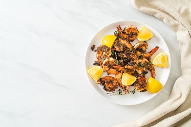 jerk shrimps or grilled shrimps in Jamaica style on plate