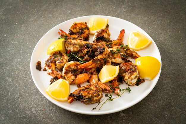 jerk shrimps or grilled shrimps in Jamaica style on plate