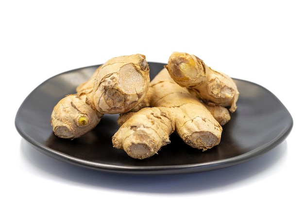 Jerusalem artichoke isolated on white background Fresh jerusalem artichoke Organic food close up