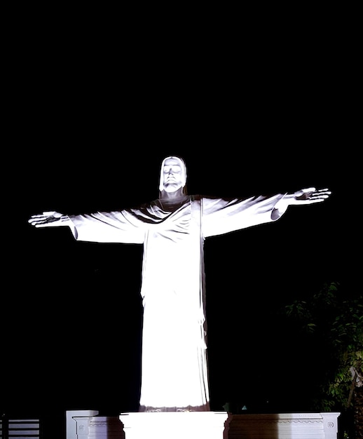 Jesus christ statue against clear sky