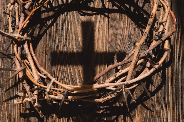 Jesus Crown Thorns and nails and cross on a wood background Crucifixion Of Jesus Christ Passion Of Jesus Christ Concept for faith spirituality and religion Easter Day