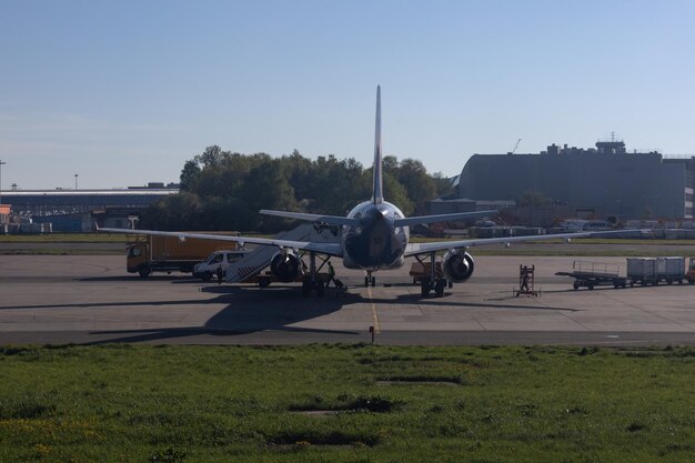 Jet passenger aircraft in the parking lot at the airport