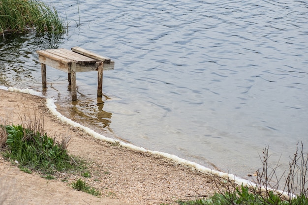 Jetty of a calm lake of salt water