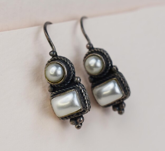 Photo jewelry earrings made of natural stone on a white background