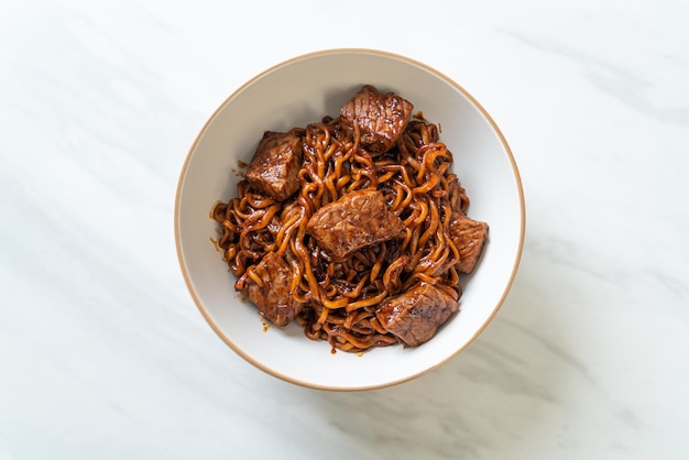 Jjapaguri or Chapaguri Korean Black Beans Spicy Noodles with Beef