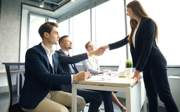 Job applicant having interview. Handshake while job interviewing