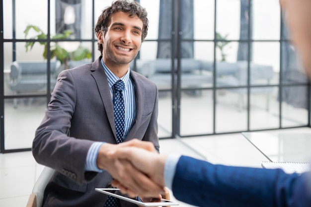 Job applicant having interview Handshake while job interviewing