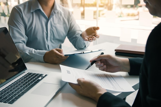 Job applicants are holding a resume document in the job interview room job interview concept