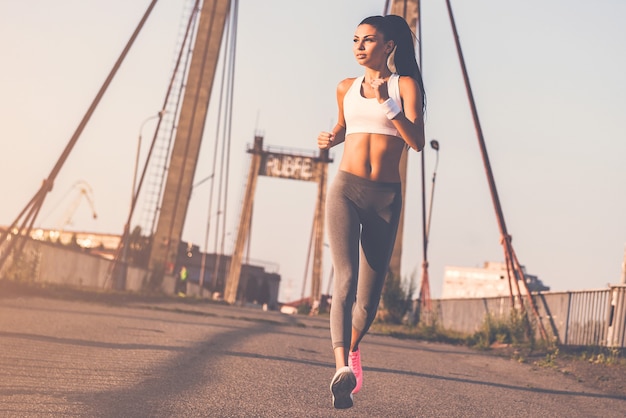 jogging is her life. full length of beautiful young woman in sports clothing 