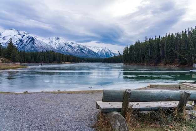 johnson lake frozen water surface in winter banff national park canadian rockies alberta canada