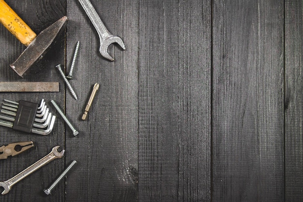 Joinery tools on a dark wooden table Place for the text A concept for Father's Day Top view Flat laying