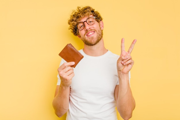 Joyful and carefree showing a peace symbol with fingers