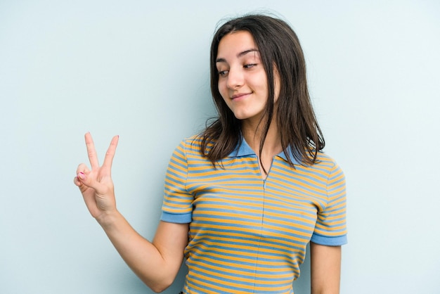 Joyful and carefree showing a peace symbol with fingers