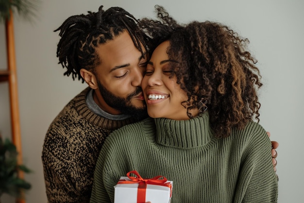 joyful Embrace African American Couple Sharing a Heartfelt Moment with a Festive Gift