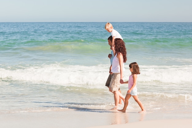 Joyful family at the beach