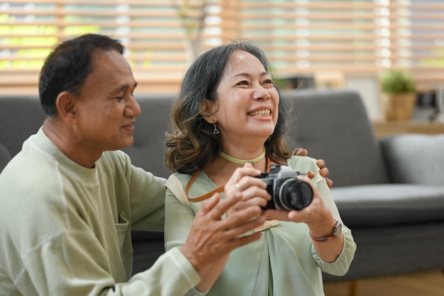 Joyful retired couple getting ready for travel vacation after quarantine Traveling in retirement concept