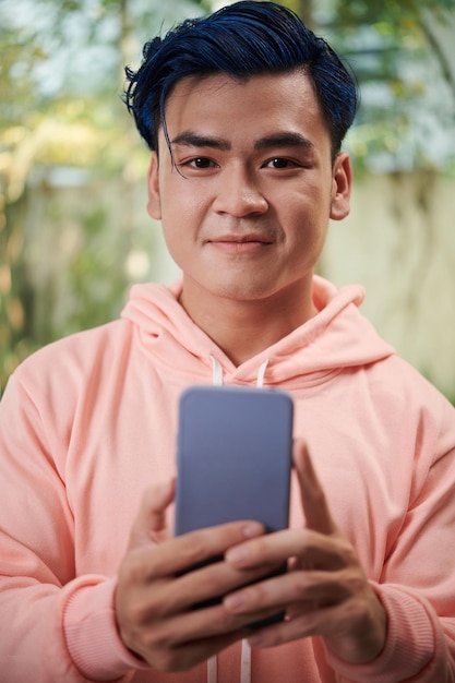 Joyful Young Man Taking Selfie