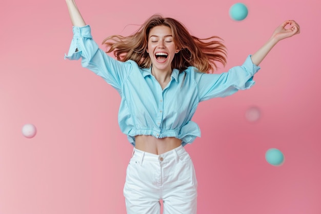 Photo a joyful young woman is energetically jumping against a vibrant pink background expressing freedom and excitement