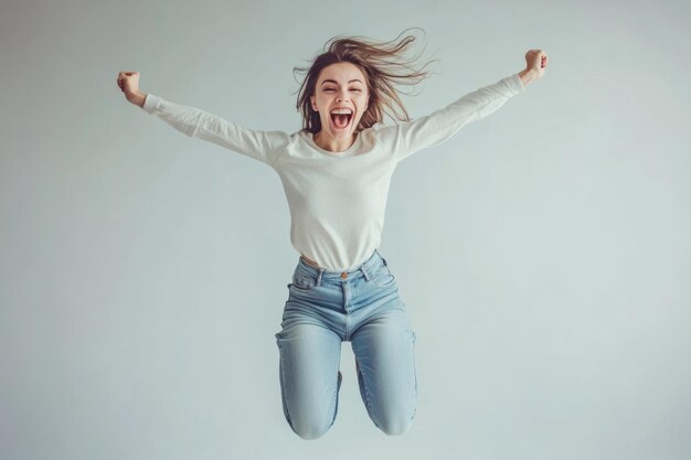 Photo joyful young woman jumps in excitement she expresses happiness with open arms this vibrant image captures the essence of freedom and fun generative ai