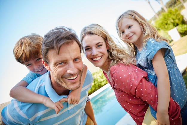 The joys of family life Portrait of a happy family enjoying a day outdoors together