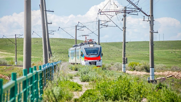 Jrapi, Armenia May 14, 2018: The Yerevan-Gyumri train passes through the countryside near the village of Jrapi.