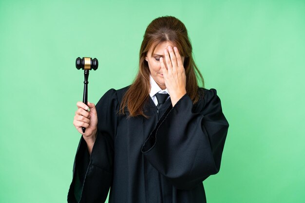 Judge caucasian woman over isolated background with tired and sick expression