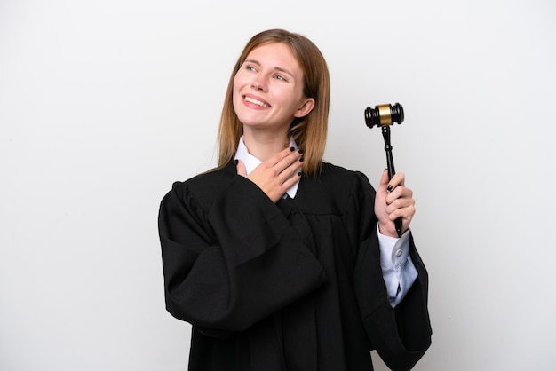 Judge English woman isolated on white background looking up while smiling