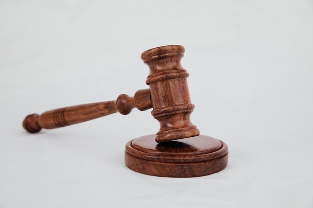 Judge gavel closeup on a white background