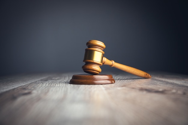 judge gavel on the wooden table surface