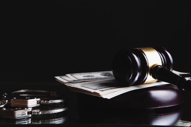 Judge's hammer and handcuffs on the table