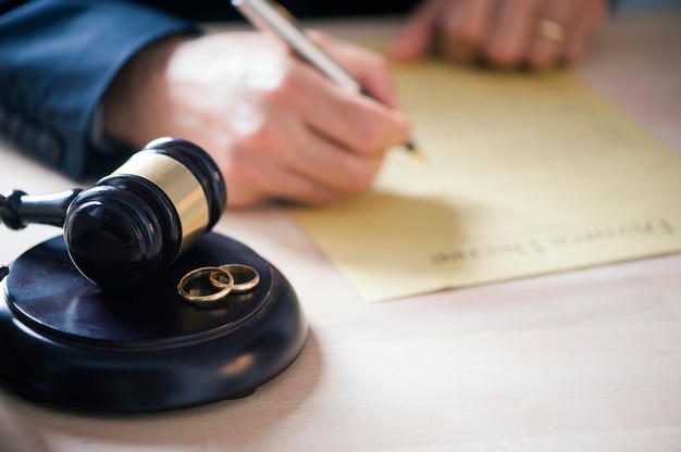 Judge with gavel on table