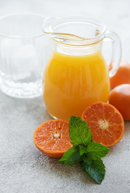 Jug of fresh orange tangerine juice